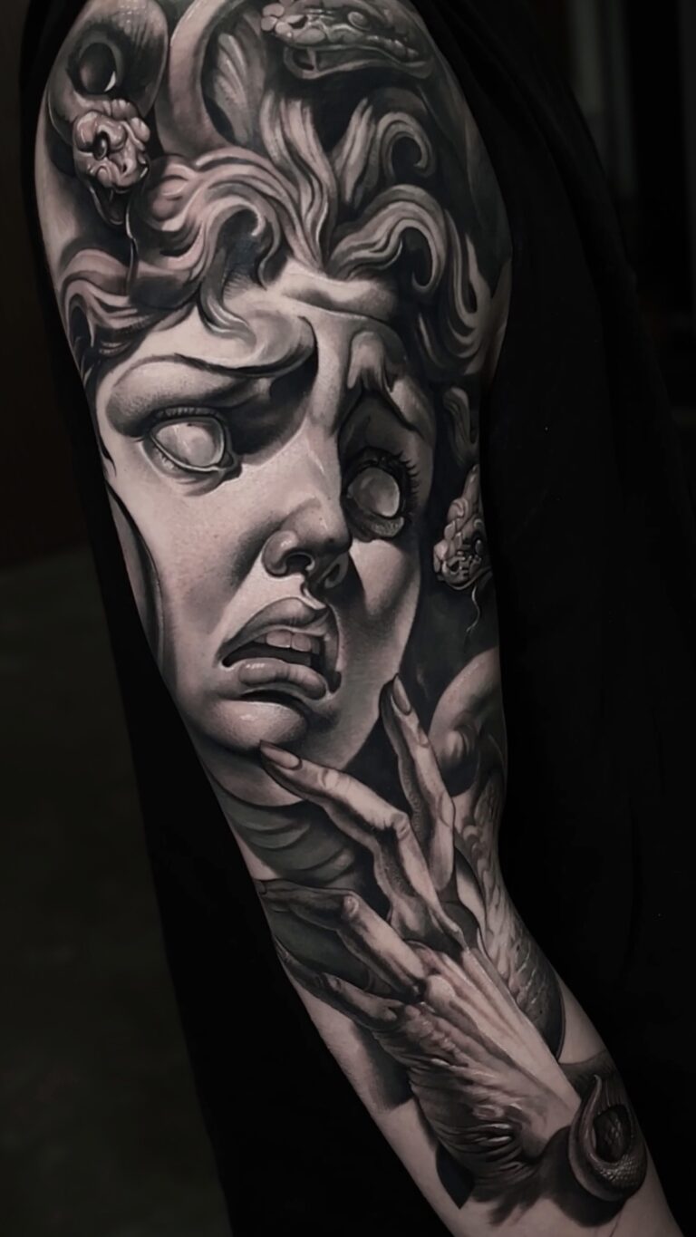 Black and grey realism tattoo by Bryn Holman featuring detailed contrast, inspired by mythology, film, and philosophy.